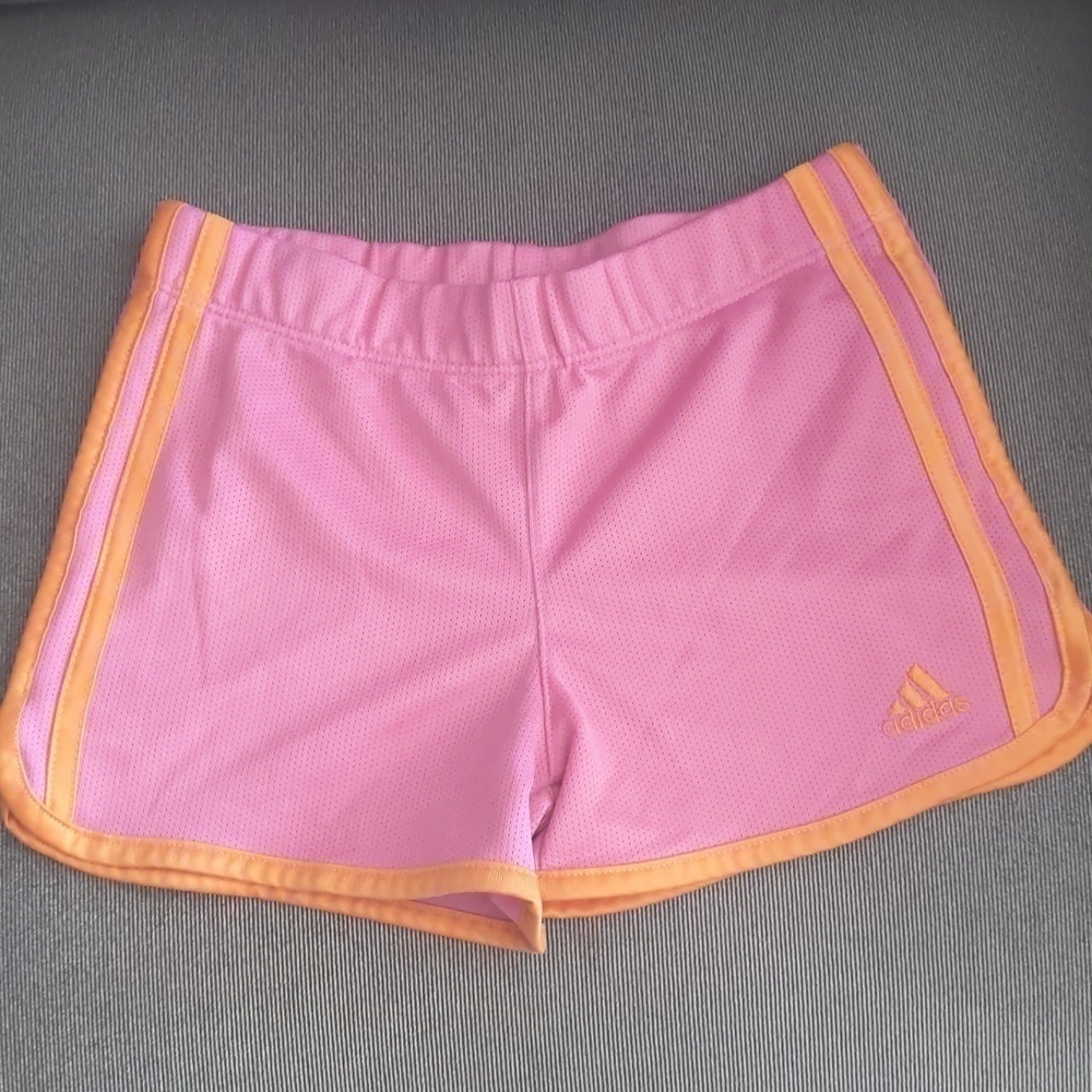 Girl's Adidas shorts size 6. Orange and pink.